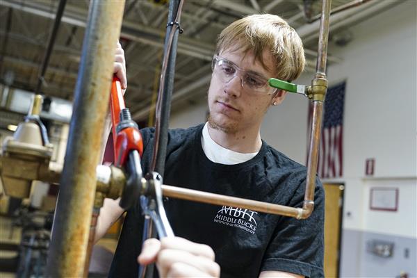PLUMBING & HEATING TECHNOLOGY student working in lab
